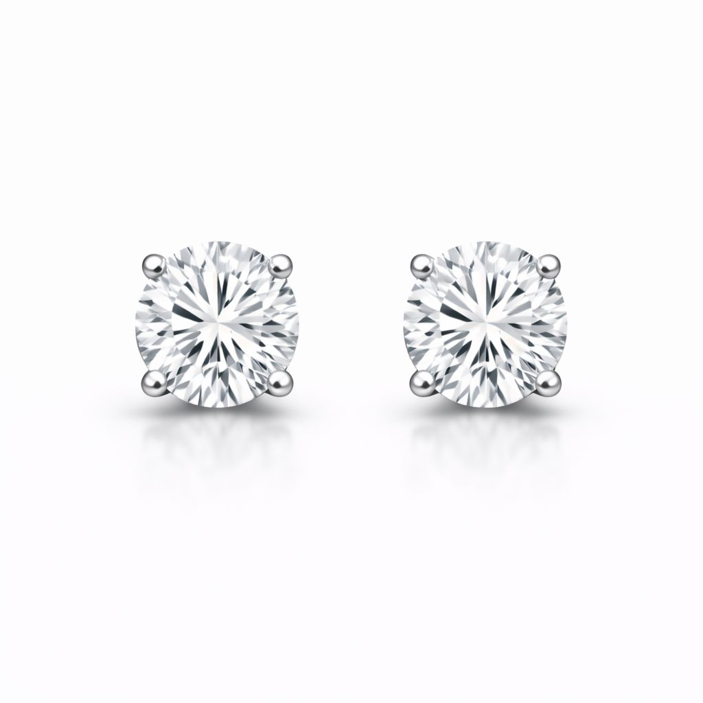 Minimalist round diamond earrings, 0.40 ct, DE/VS–VVS, in 585 white gold.