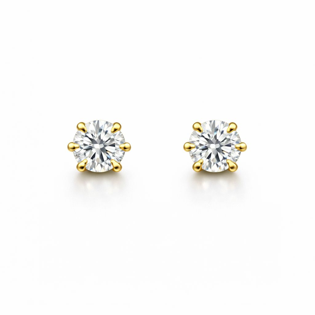 Round-cut diamond stud earrings, 0.20 ct, in 585 rose gold.
