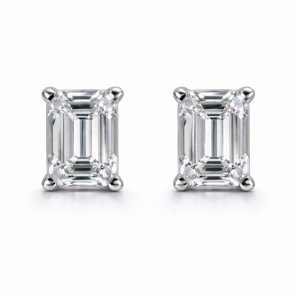 Emerald-cut diamond earrings, 1.03 ct, E/VS2, in 585 white gold — the strict geometry of brilliance.