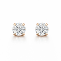 Round-cut diamond stud earrings, 0.20 ct, in 585 rose gold.