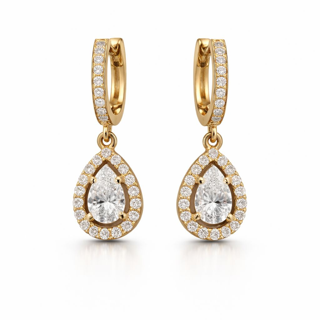 Pear-shaped diamond earrings, 0.50 ct, with a 0.72 ct accent row in 585 yellow gold — striking brilliance.