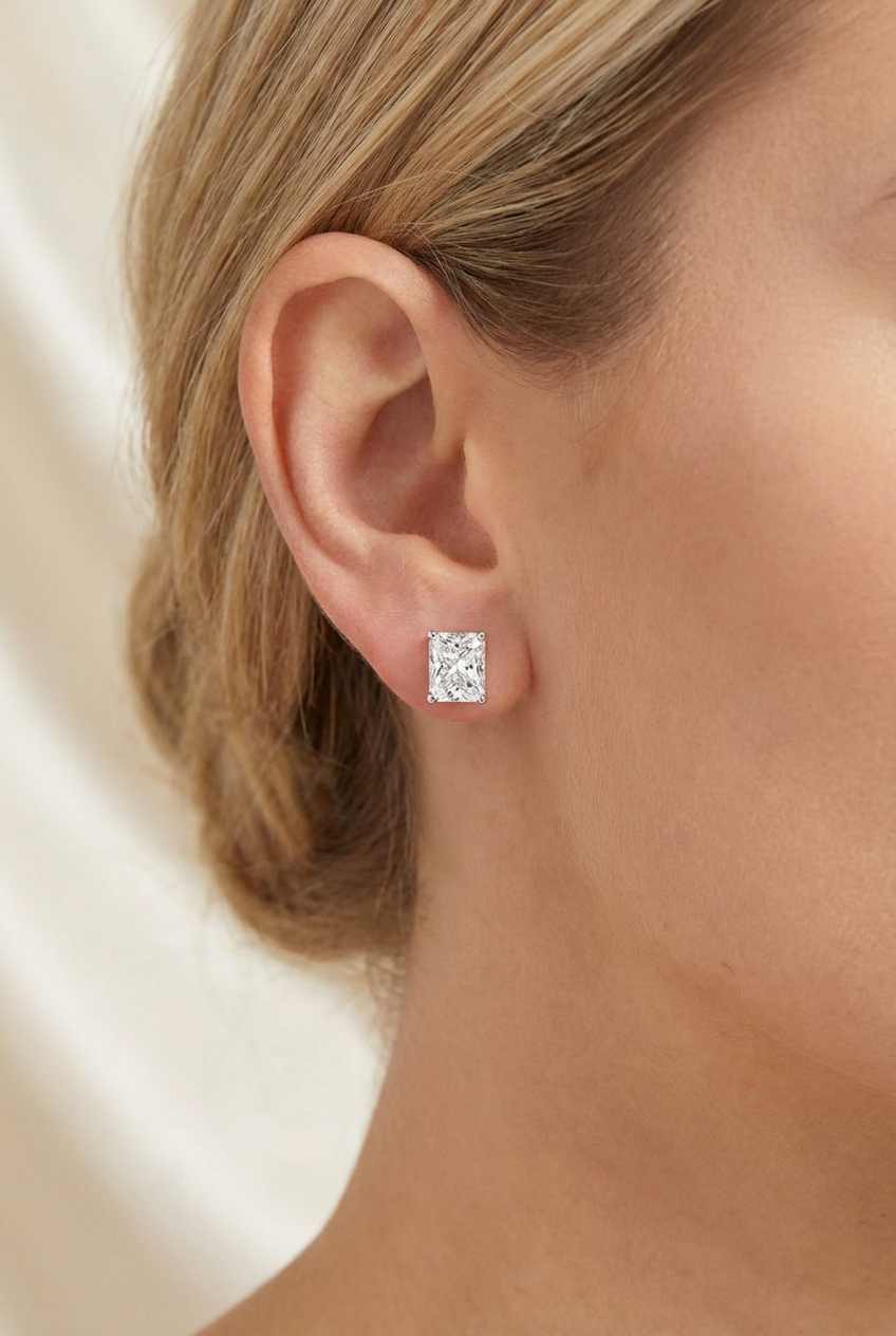 Radiant-cut diamond stud earrings, 2 carats.